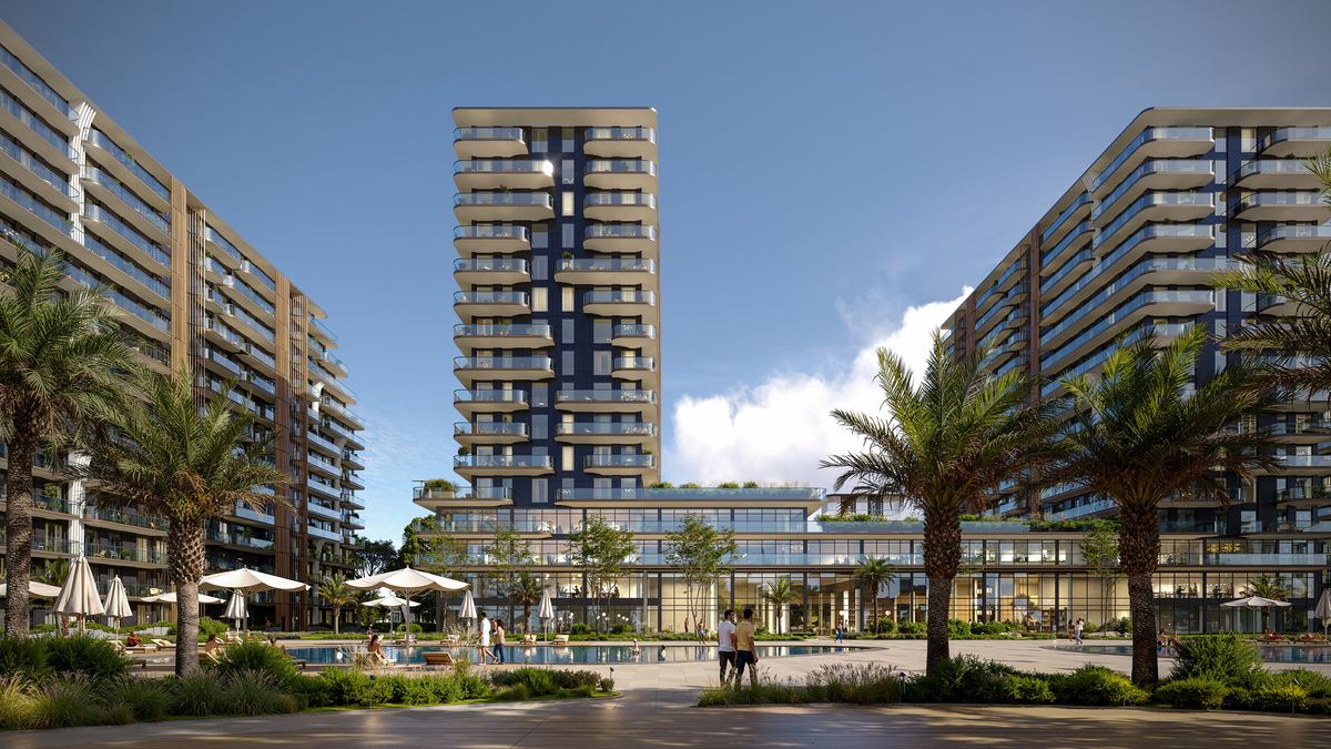 Aparthotel YES в Sea Breeze, Баку — центральная башня и двор с бассейном вечером