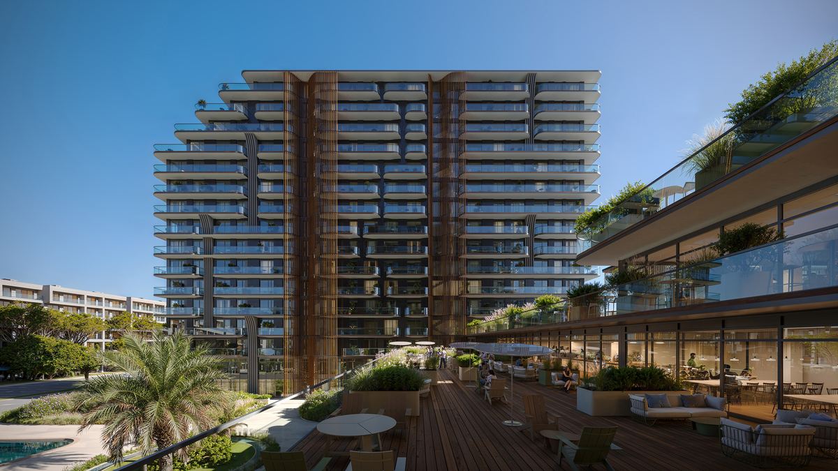 Терраса со столиками у фасада Aparthotel YES в Sea Breeze, Баку