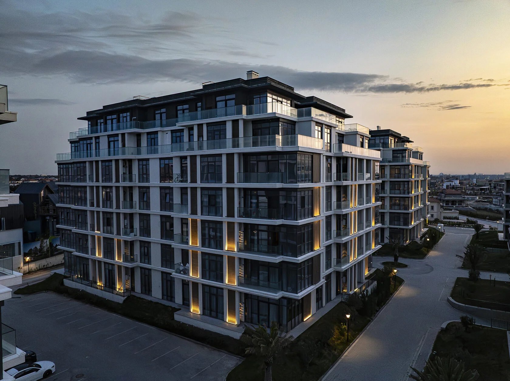 Modern residential building at Sea Breeze Baku at dusk