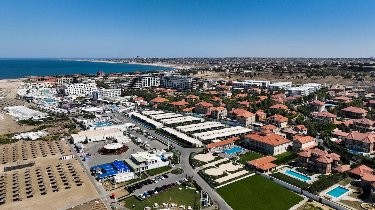 Sea Breeze resort grounds in Baku: pools, villas and the sea